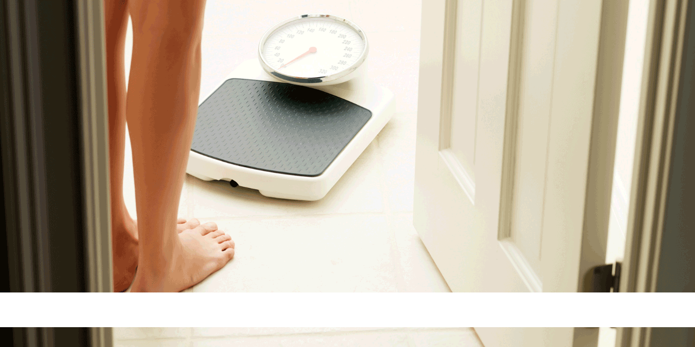 how do you adjust analog weight scales