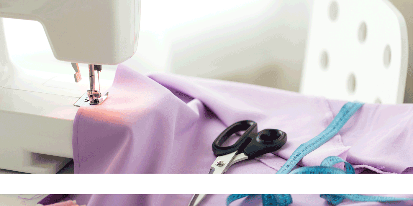 how do you feed fabric to a sewing machine