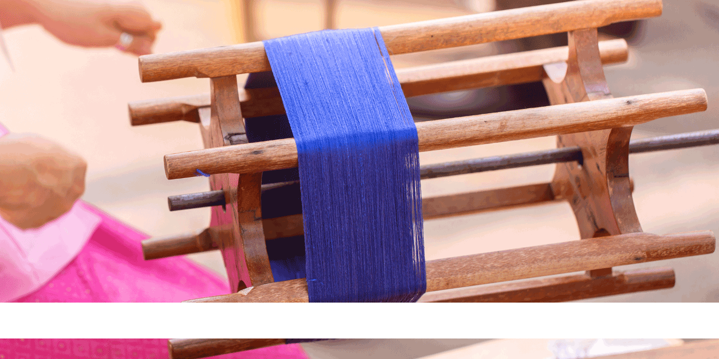 how do you use a wooden yarn winder