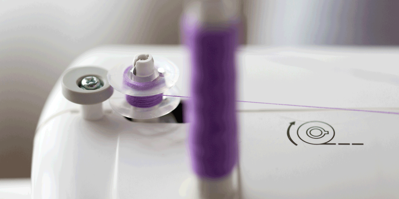 how to spool a reel sewing machine